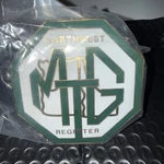 Rare "new Old Stock" Northwest Mg Register Grille Badge. Fixed Price $89.00.